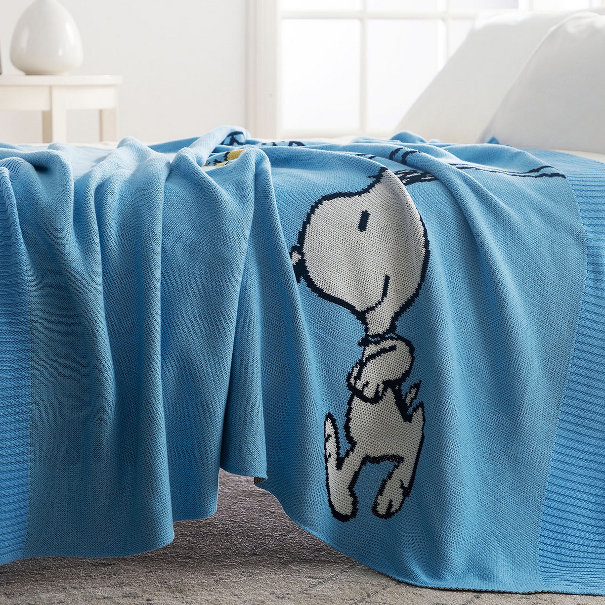 91家纺网 家纺一手货源 找家纺 栩裕纺织 2026新款史努比SNOOPY正版授权独家全棉针织毯多功能针织盖毯 史努比-我心飞翔