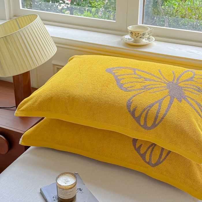 91家纺网 家纺一手货源 找家纺 乐家毛巾被（工厂自产自销） 2026新款A类全棉纯棉色织提花抗菌毛圈枕巾 黄色蝴蝶