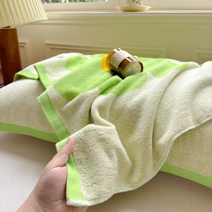91家纺网 家纺一手货源 找家纺 乐家毛巾被（工厂自产自销） 2026新款A类全棉纯棉色织提花抗菌毛圈枕巾 向阳花绿