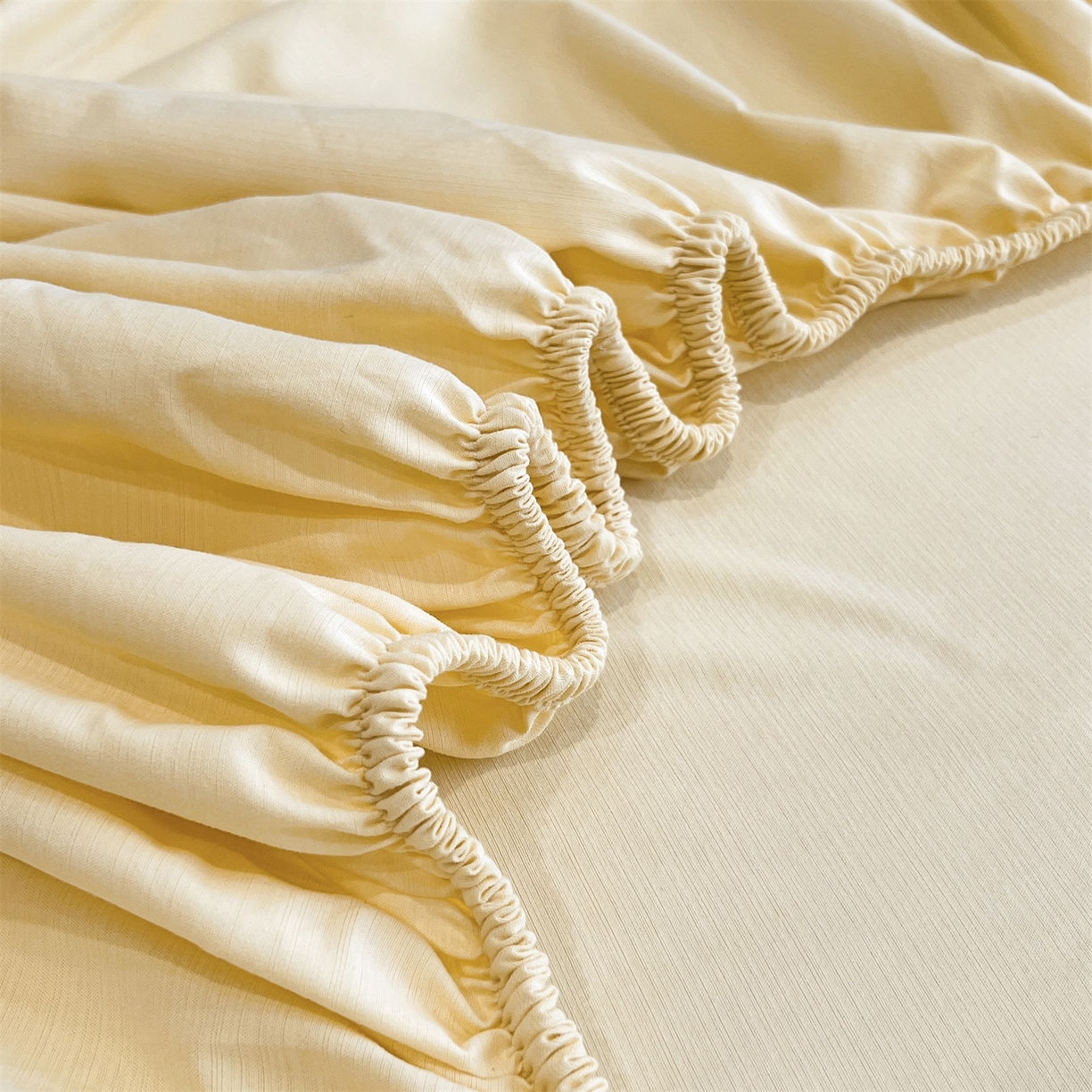 91家纺网 家纺一手货源 找家纺 慕木家纺 2026新款A类纯色印花慕丝棉床笠系列（抽空压缩可供跨境）（提供买家秀） 奶油黄