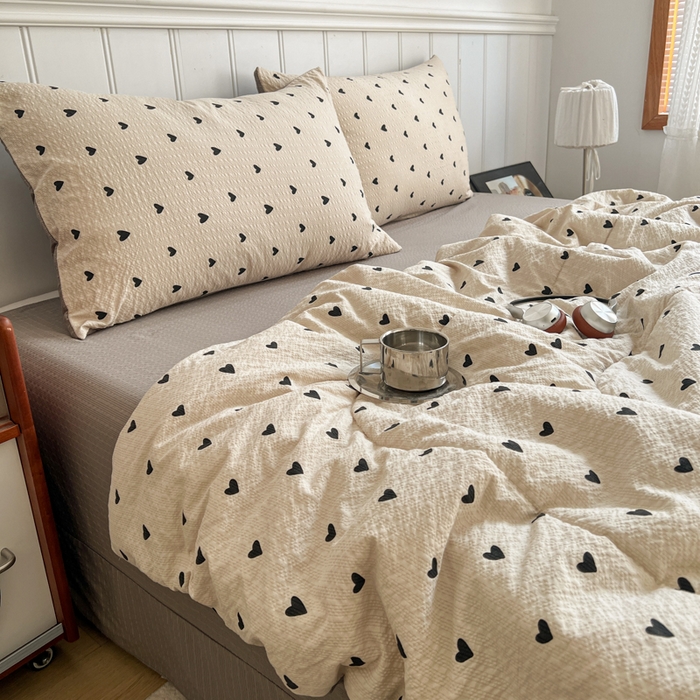 91家纺网 家纺一手货源 找家纺 欧尚家纺 2026新款泡芙纱夏被四件套简单款 咖爱心