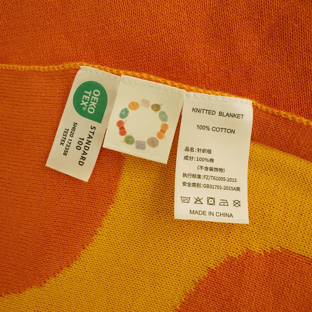 91家纺网 家纺一手货源 找家纺 暖绵绵家纺 2026新款全棉亲肤舒适毯子-艾蜜欧 橙黄色