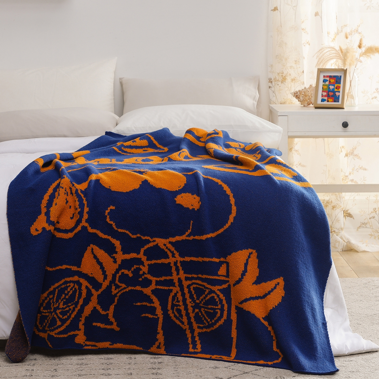 91家纺网 家纺一手货源 找家纺 苏艺针织史努比SNOOPY正版授权独家针织毯儿童毯披肩多功能盖毯礼物终端控价 史努比-香橘士