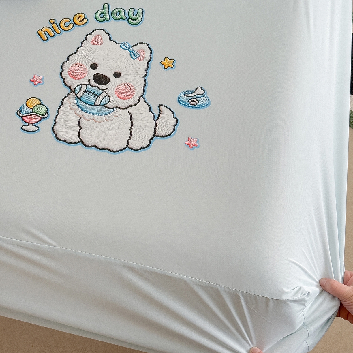 91家纺网 家纺一手货源 找家纺 TT.one 塔塔家居 2026新款A类卡通针织凉感刺绣烫印床笠 米多多-海盐蓝