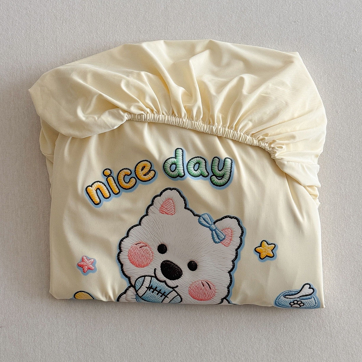 91家纺网 家纺一手货源 找家纺 TT.one 塔塔家居 2026新款A类卡通针织凉感刺绣烫印床笠 米多多-奶昔黄