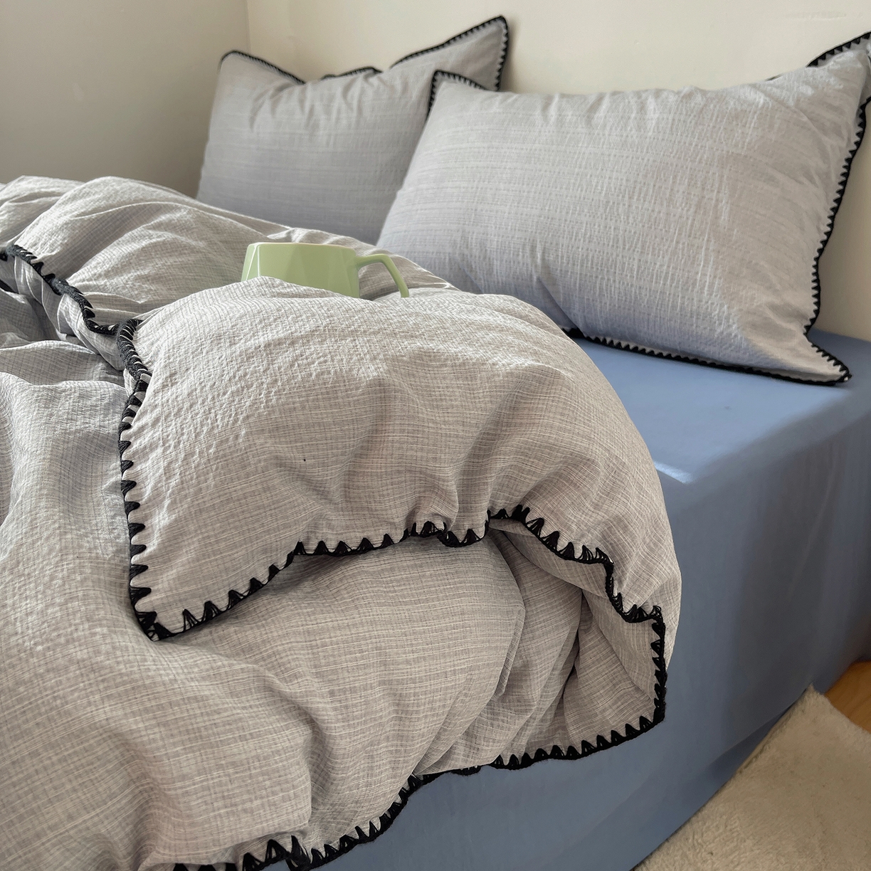 91家纺网 家纺一手货源 找家纺 凯洛奇 2026新款色织阳离子贝壳边四件套 阳离子-云灰