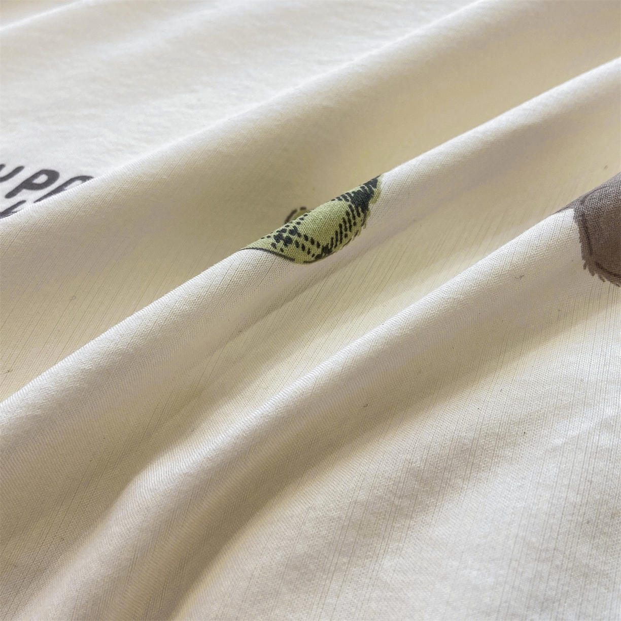 91家纺网 家纺一手货源 找家纺 慕木家纺 2026新款A类印花拼角工艺慕斯棉四件套系列（抽空压缩可供跨境）提供买家秀 蛋糕熊+绿