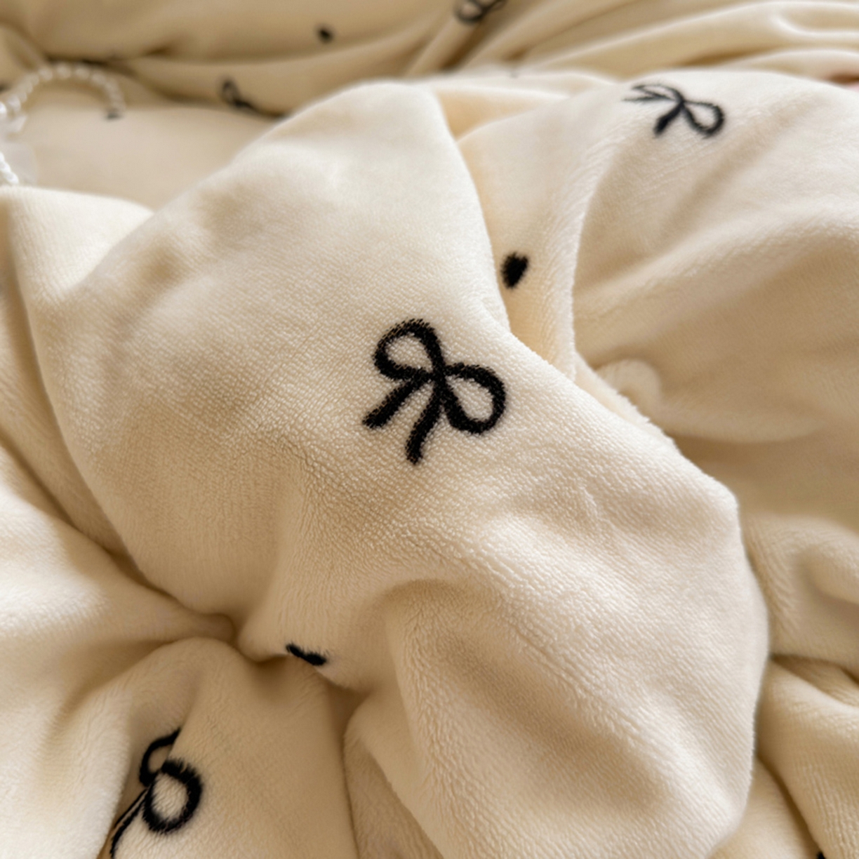 91家纺网 家纺一手货源 找家纺 欧妮家纺 2025新款A类牛奶绒印花单被套-单件被套 蝴蝶结