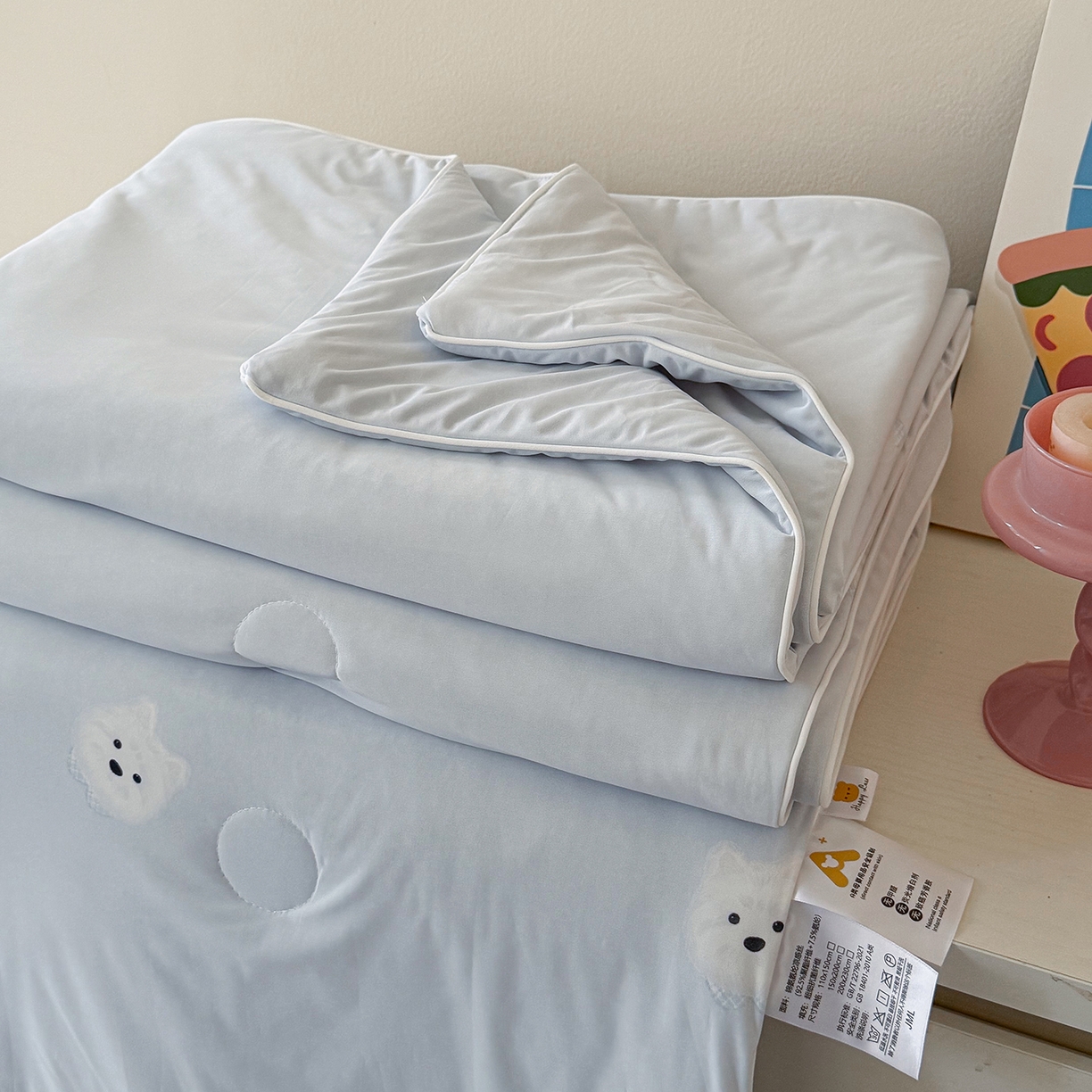 91家纺网 家纺一手货源 找家纺 金梦拉家纺 2026春夏新款锦氨凉感丝印花系列夏被空调被夏凉被 泡芙小狗