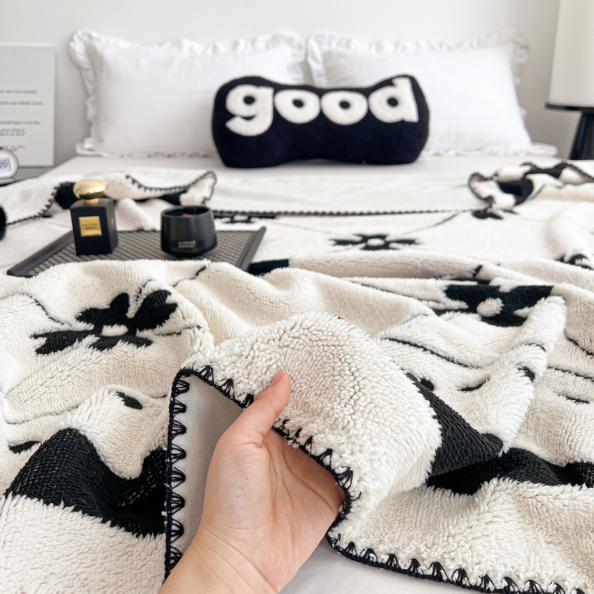 91家纺网 家纺一手货源 找家纺 娜朵家纺 2026新款阳离子牛奶绒双层毛球复合毯 齐花绽放