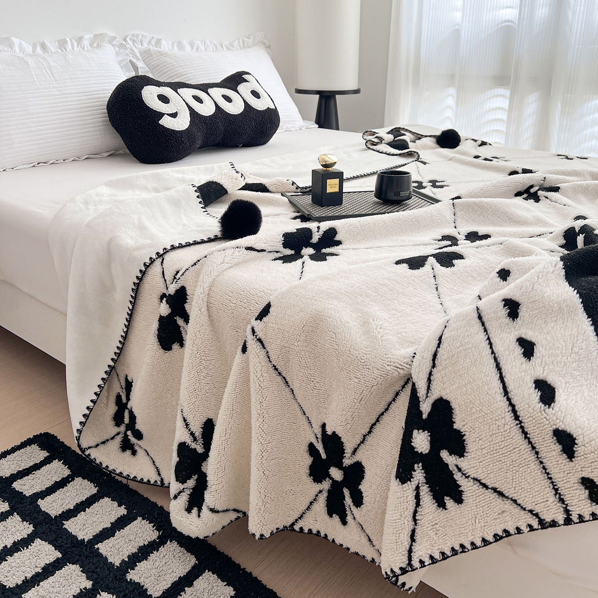 91家纺网 家纺一手货源 找家纺 娜朵家纺 2026新款阳离子牛奶绒双层毛球复合毯 齐花绽放