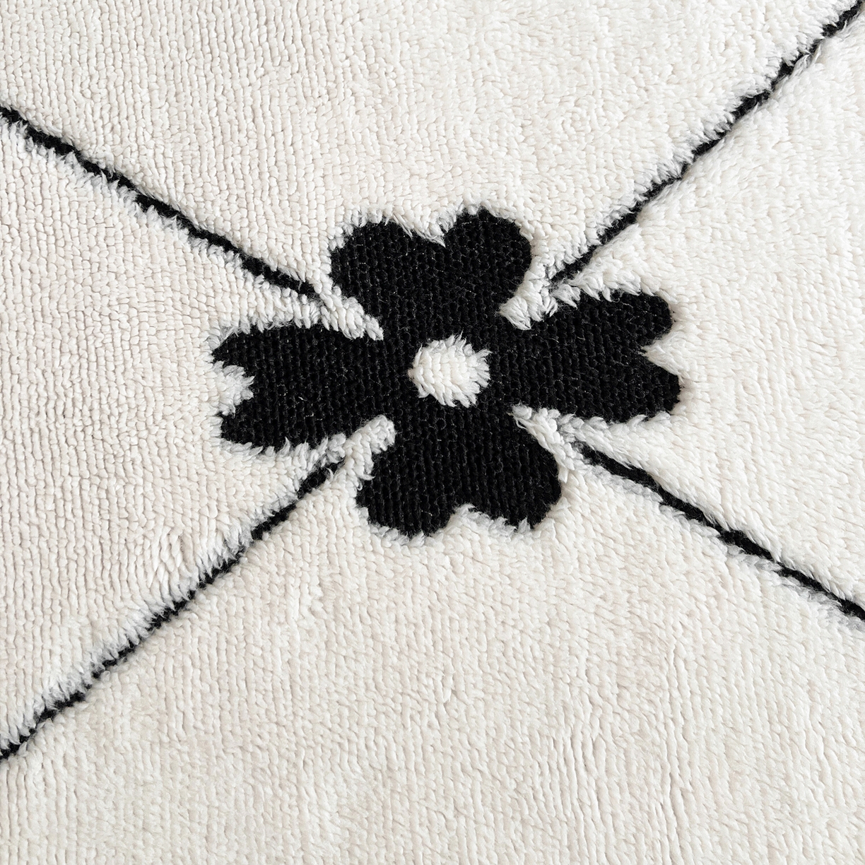 91家纺网 家纺一手货源 找家纺 娜朵家纺 2026新款阳离子牛奶绒双层毛球复合毯 齐花绽放