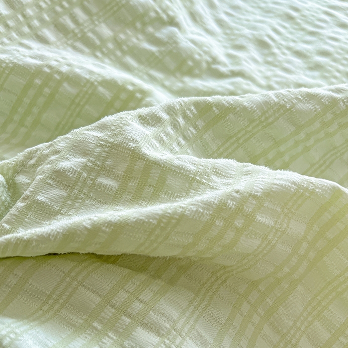 91家纺网 家纺一手货源 找家纺 仟网汇 2026新款赫本纯色泡泡纱花边款夏被夏凉被空调被四件套 芥末绿