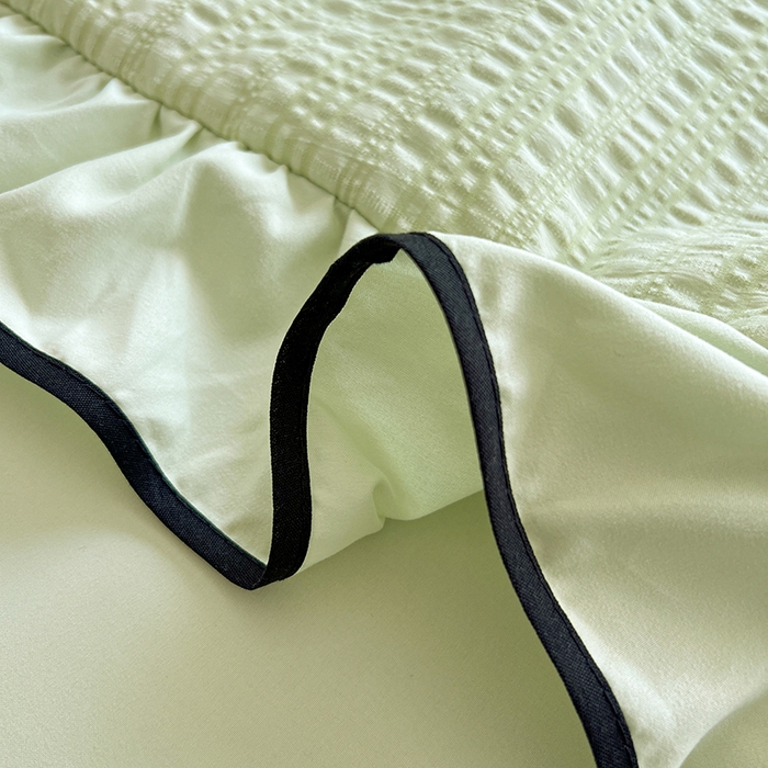 91家纺网 家纺一手货源 找家纺 仟网汇 2026新款赫本纯色泡泡纱花边款夏被夏凉被空调被四件套 芥末绿