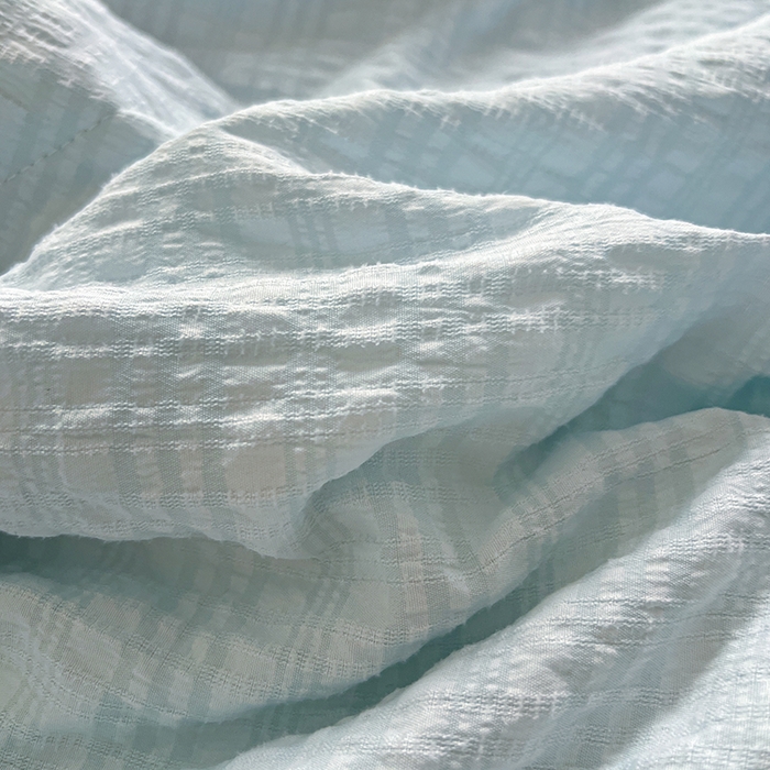 91家纺网 家纺一手货源 找家纺 仟网汇 2026新款赫本纯色泡泡纱花边款夏被夏凉被空调被四件套 天空蓝