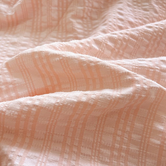 91家纺网 家纺一手货源 找家纺 仟网汇 2026新款赫本纯色泡泡纱花边款夏被夏凉被空调被四件套 樱花粉