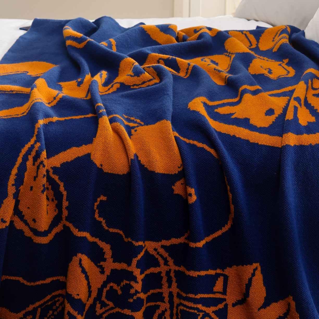 91家纺网 家纺一手货源 找家纺 栩裕纺织 2026新款史努比SNOOPY正版授权独家针织毯披肩膝盖毯儿童毯多功能盖毯送礼礼品终端控价 史努比-香橘士