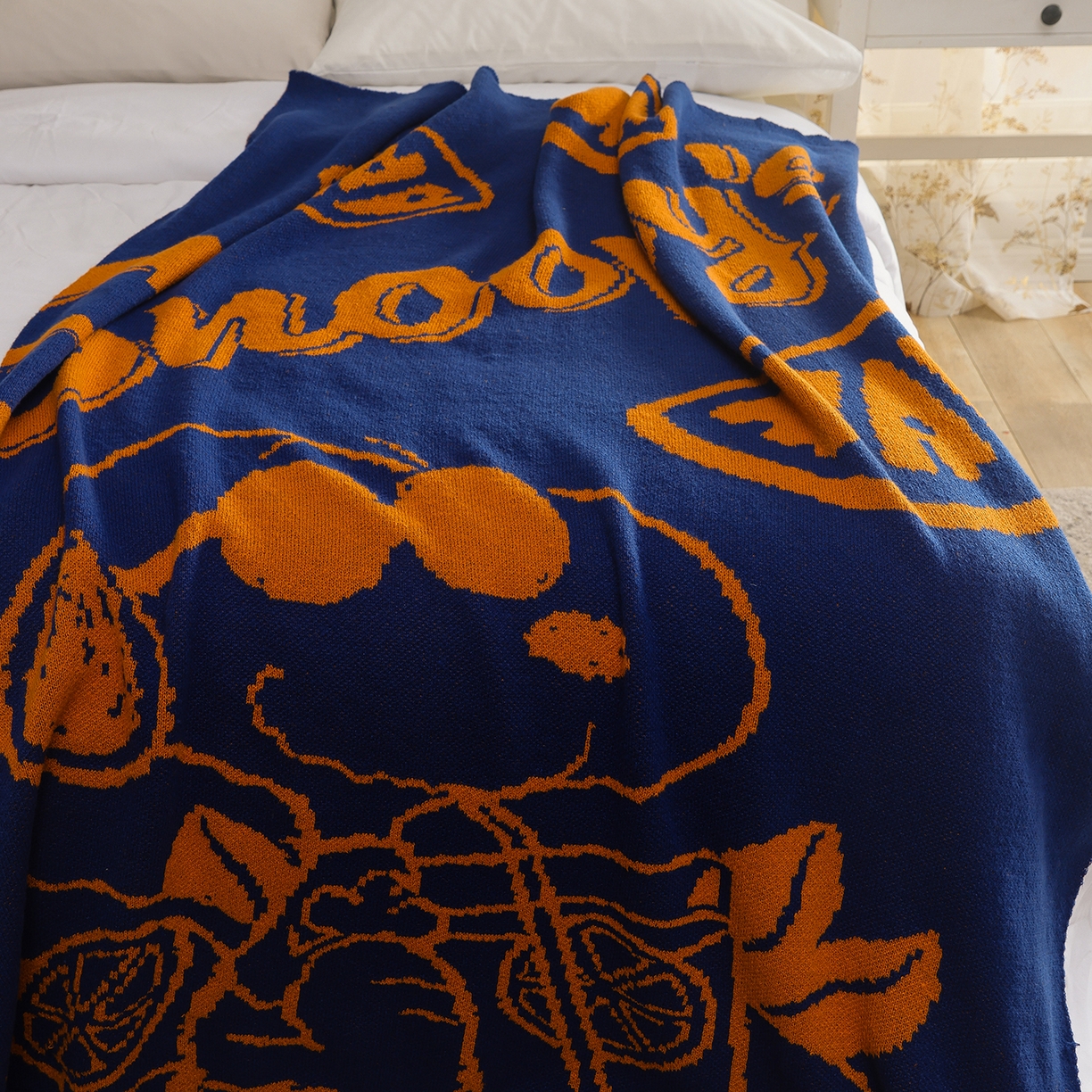 91家纺网 家纺一手货源 找家纺 栩裕纺织 2026新款史努比SNOOPY正版授权独家针织毯披肩膝盖毯儿童毯多功能盖毯送礼礼品终端控价 史努比-香橘士