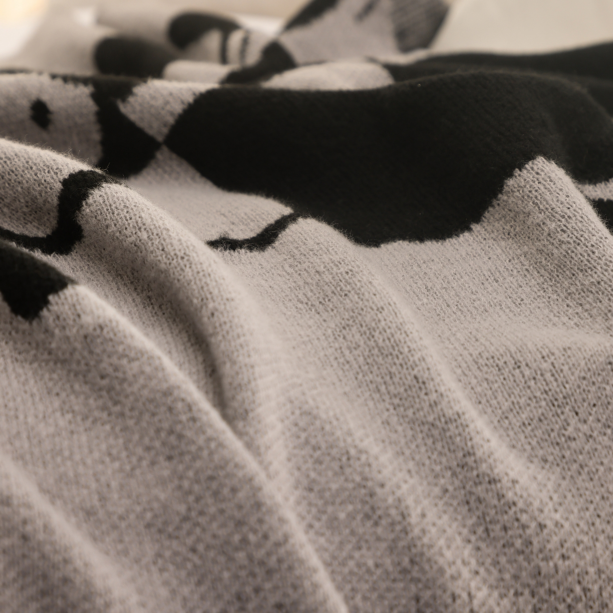 91家纺网 家纺一手货源 找家纺 栩裕纺织 2026新款史努比SNOOPY正版授权独家针织毯披肩膝盖毯儿童毯多功能盖毯送礼礼品终端控价 史努比-织梦