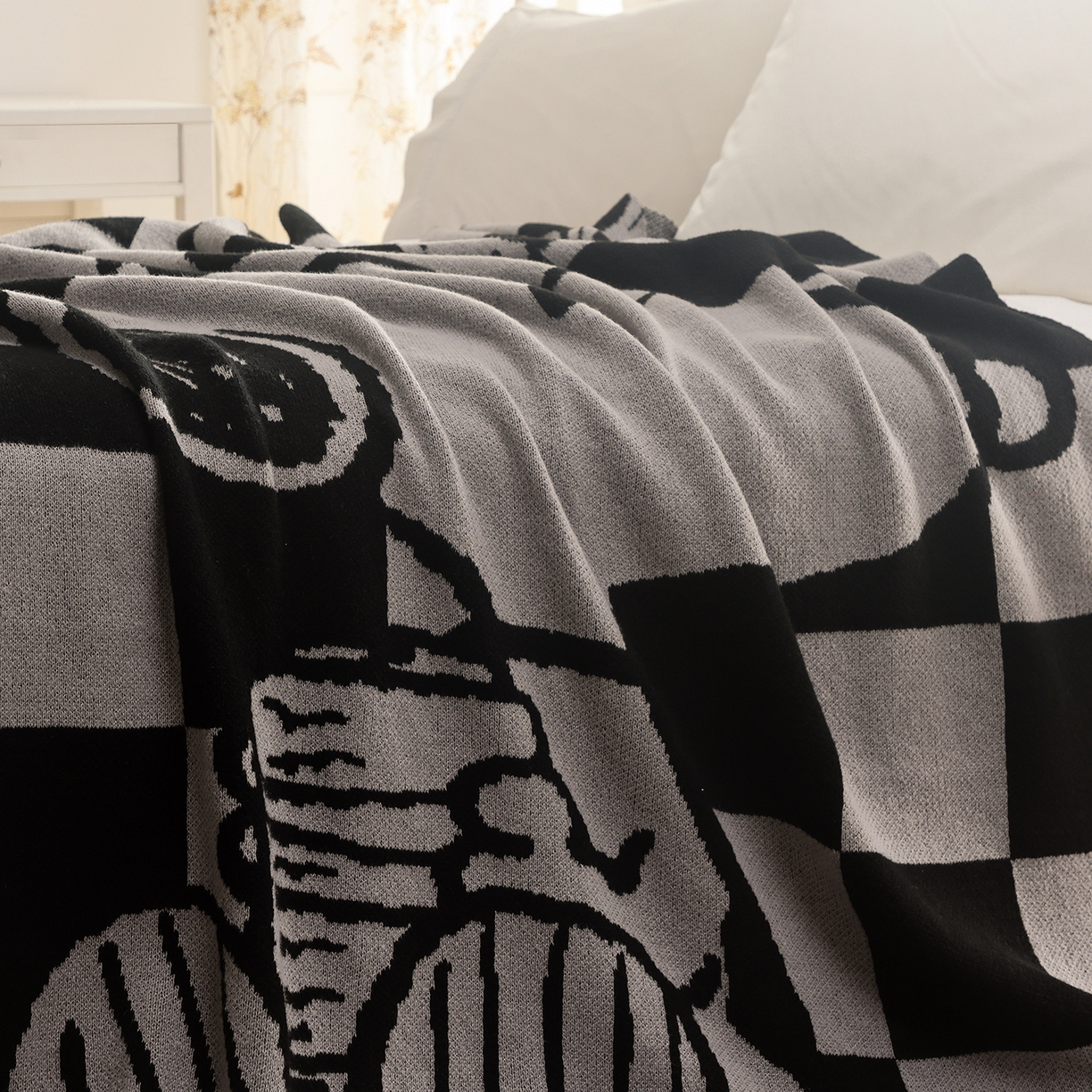 91家纺网 家纺一手货源 找家纺 栩裕纺织 2026新款史努比SNOOPY正版授权独家针织毯披肩膝盖毯儿童毯多功能盖毯送礼礼品终端控价 史努比-织梦