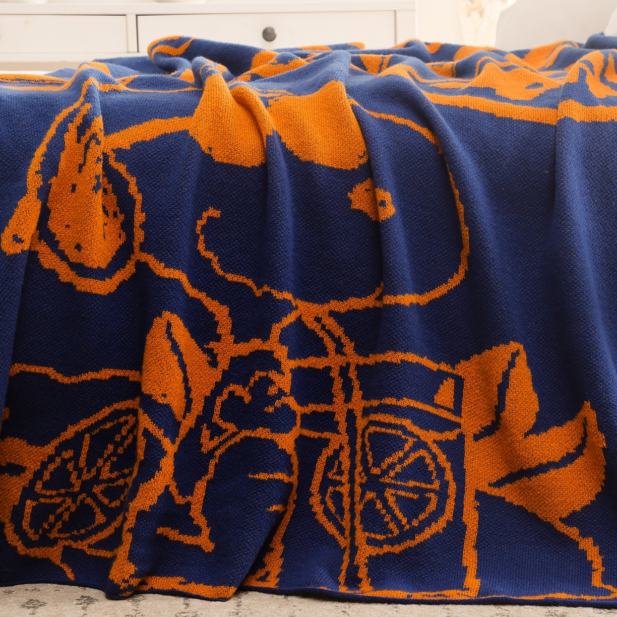 91家纺网 家纺一手货源 找家纺 栩裕纺织 2026新款史努比SNOOPY正版授权独家针织毯披肩膝盖毯儿童毯多功能盖毯送礼礼品终端控价 史努比-香橘士