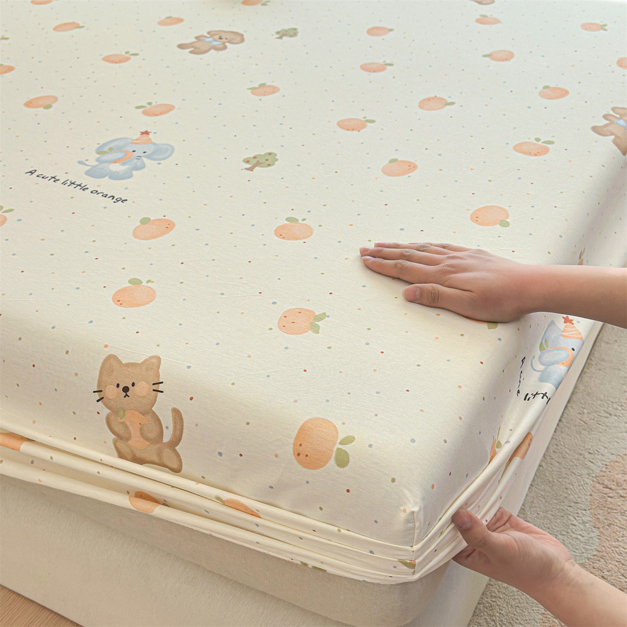 91家纺网 家纺一手货源 找家纺 女子家纺 2026新款全棉纯棉印花卡通单床笠 橘子象宝