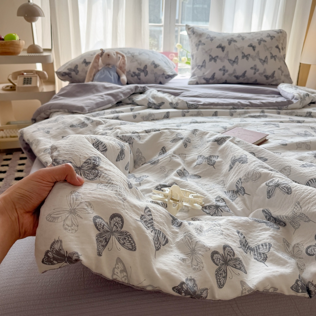 91家纺网 家纺一手货源 找家纺 温眠家纺 2026新款针织泡芙双层纱夏被四件套 墨蝶