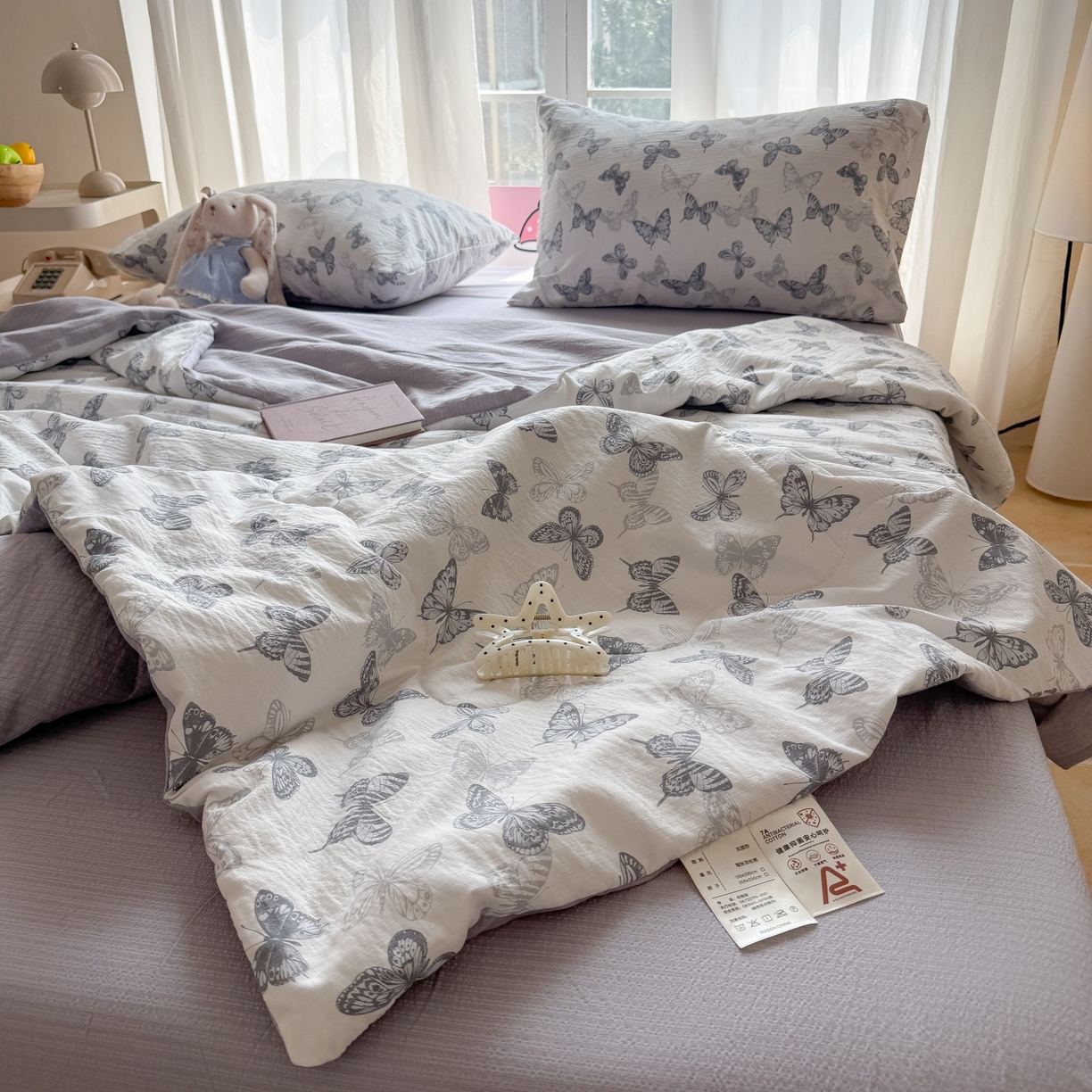 91家纺网 家纺一手货源 找家纺 温眠家纺 2026新款针织泡芙双层纱夏被四件套 墨蝶