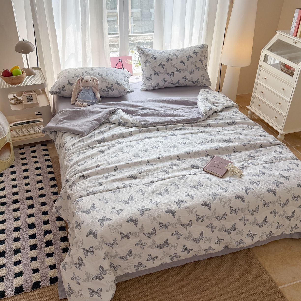 91家纺网 家纺一手货源 找家纺 温眠家纺 2026新款针织泡芙双层纱夏被四件套 墨蝶