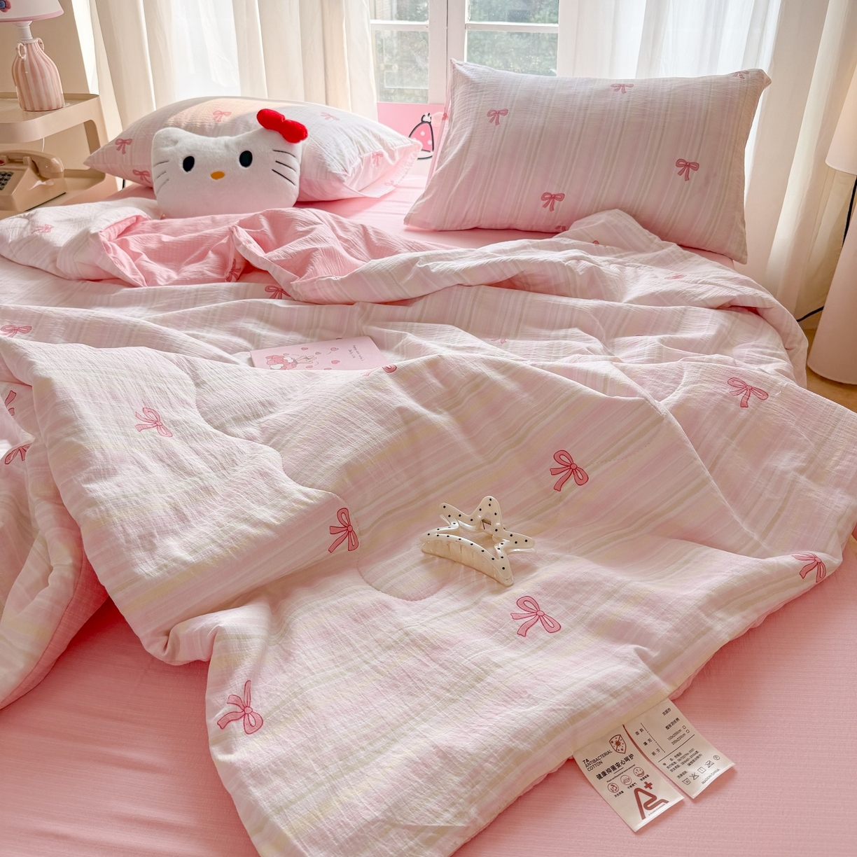 91家纺网 家纺一手货源 找家纺 温眠家纺 2026新款针织泡芙双层纱夏被四件套 粉蝴蝶结