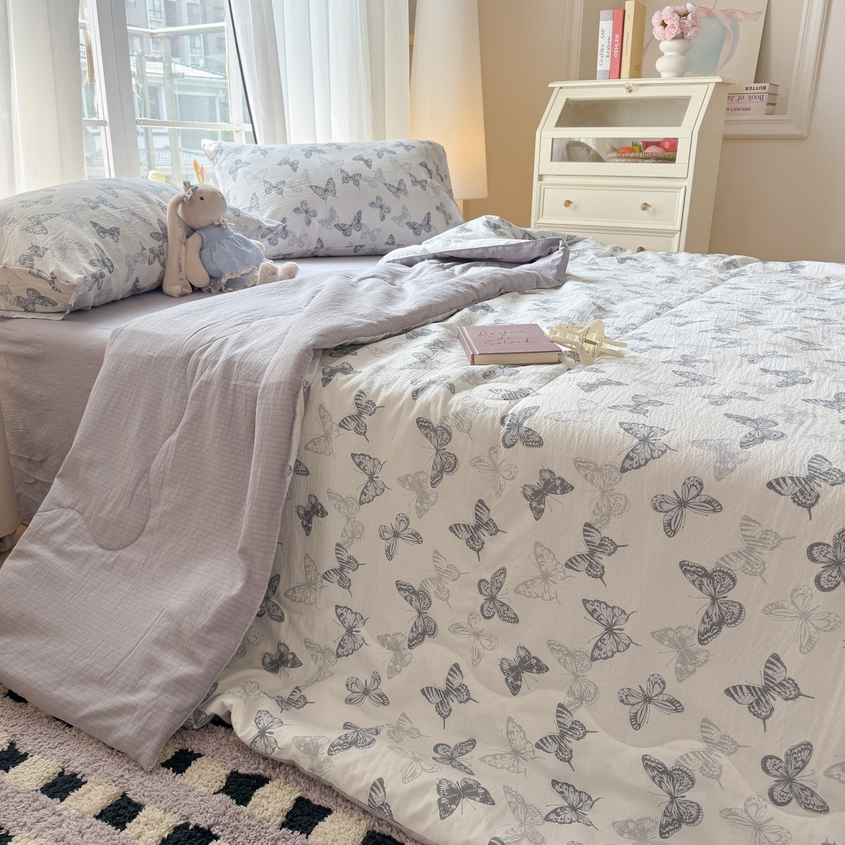 91家纺网 家纺一手货源 找家纺 温眠家纺 2026新款针织泡芙双层纱夏被四件套 墨蝶