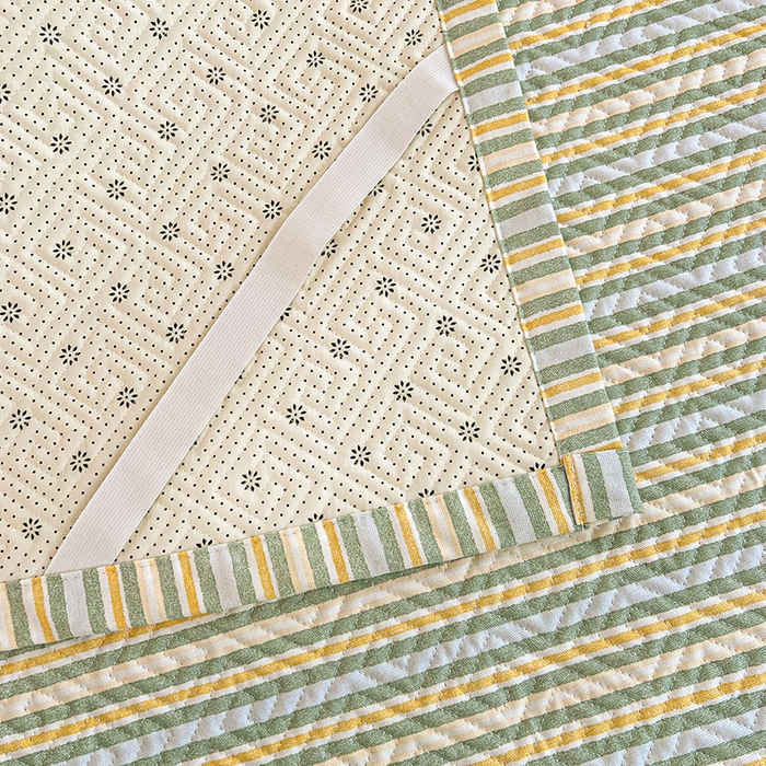 91家纺网 家纺一手货源 找家纺 忆生活家纺 2026新款学生床全棉老粗布软凉席夹棉床盖 条纹绿