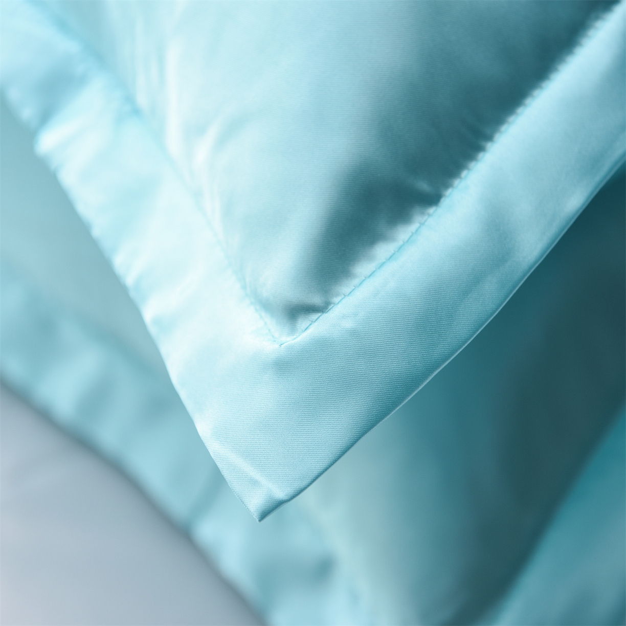 91家纺网 家纺一手货源 找家纺 经年 2026新款特价款丝绸冰丝四件套 水蓝白