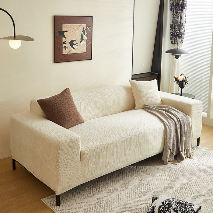 91家纺网 家纺一手货源 找家纺 飞翔家纺沙发套 2026新款素格纹沙发套 米白色