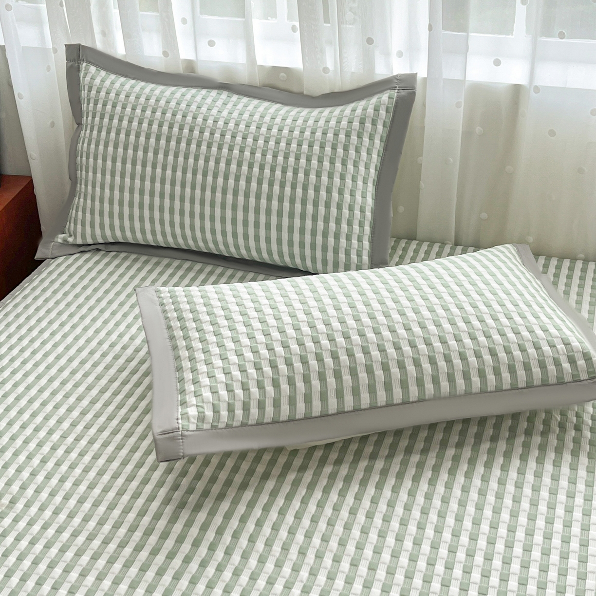 91家纺网 家纺一手货源 找家纺 摩妮卡 2026新款豆豆凉席PE高分子凉感床笠软席冰丝席三件套 色彩格-绿