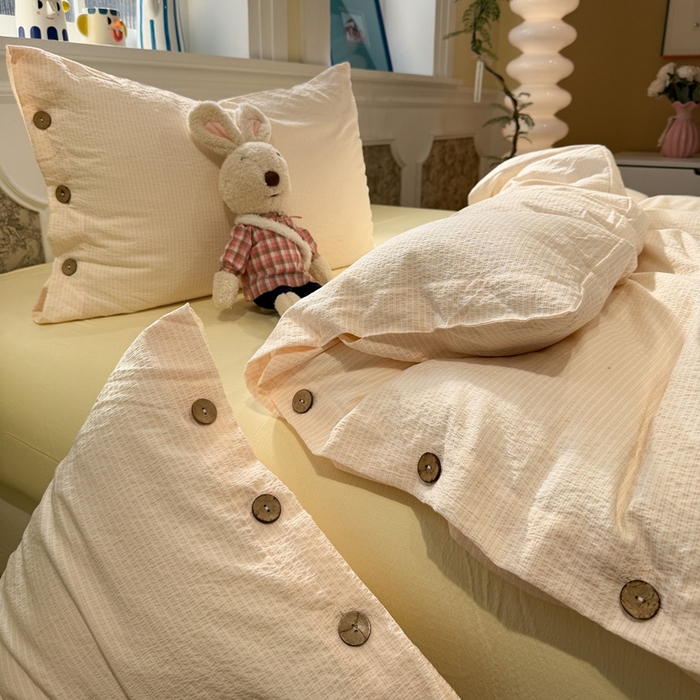 91家纺网 家纺一手货源 找家纺 水墨江南 2026新款无印风水洗提花纽扣款四件套 蜜粉条-黄