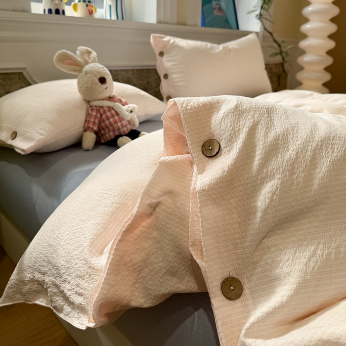 91家纺网 家纺一手货源 找家纺 水墨江南 2026新款无印风水洗提花纽扣款四件套 蜜粉条-蓝