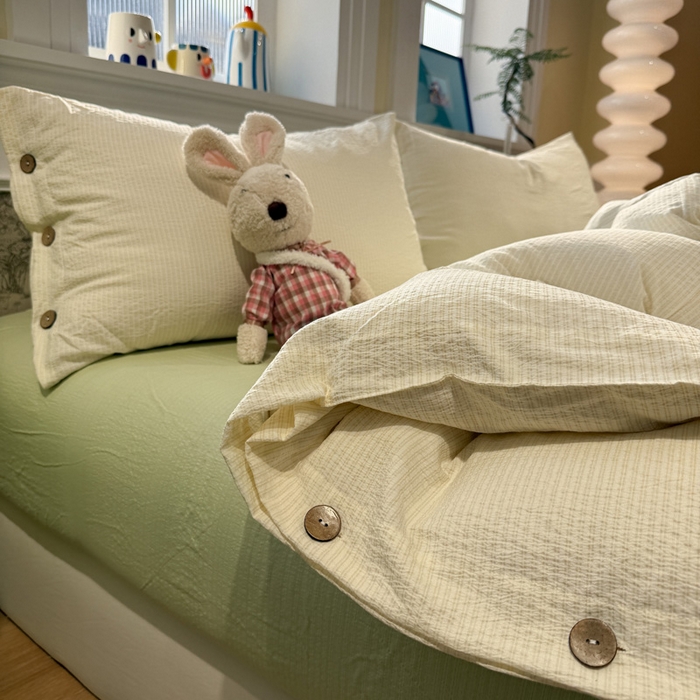 91家纺网 家纺一手货源 找家纺 水墨江南 2026新款无印风水洗提花纽扣款四件套 柠檬细条