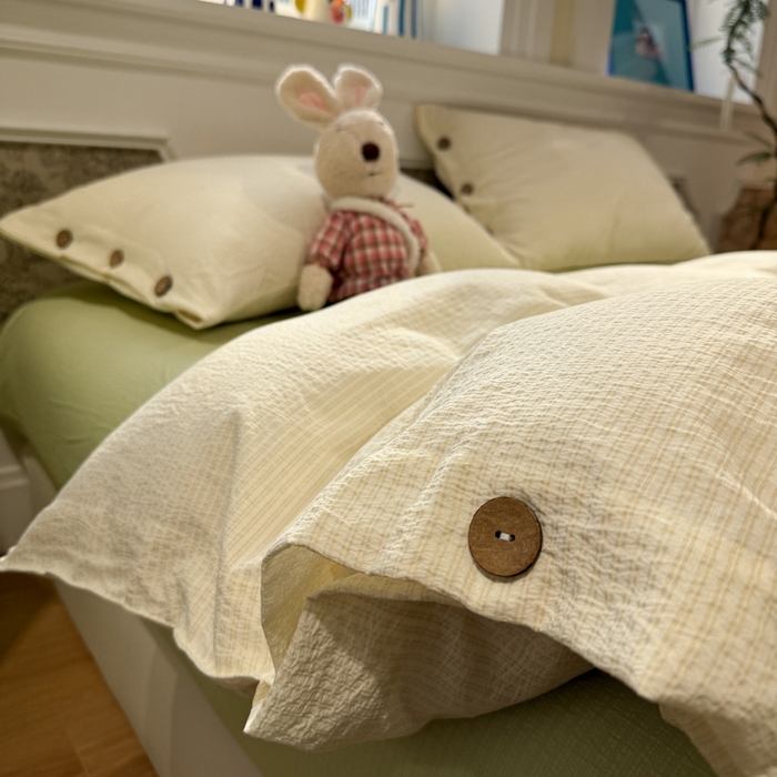 91家纺网 家纺一手货源 找家纺 水墨江南 2026新款无印风水洗提花纽扣款四件套 柠檬细条