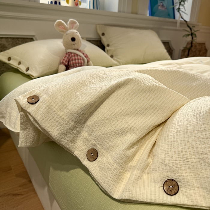 91家纺网 家纺一手货源 找家纺 水墨江南 2026新款无印风水洗提花纽扣款四件套 柠檬细条