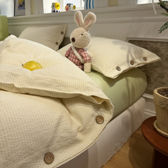 91家纺网 家纺一手货源 找家纺 水墨江南 2026新款无印风水洗提花纽扣款四件套 柠檬细条