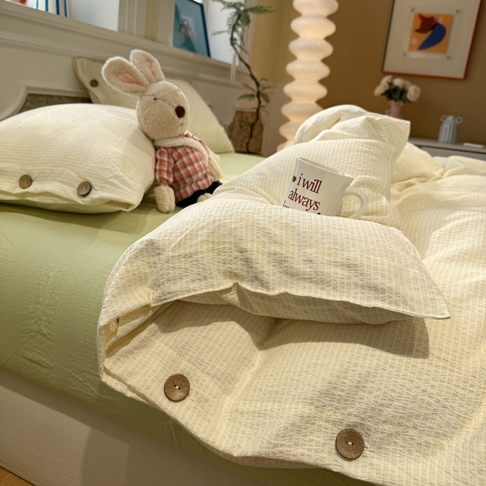 91家纺网 家纺一手货源 找家纺 水墨江南 2026新款无印风水洗提花纽扣款四件套 柠檬细条