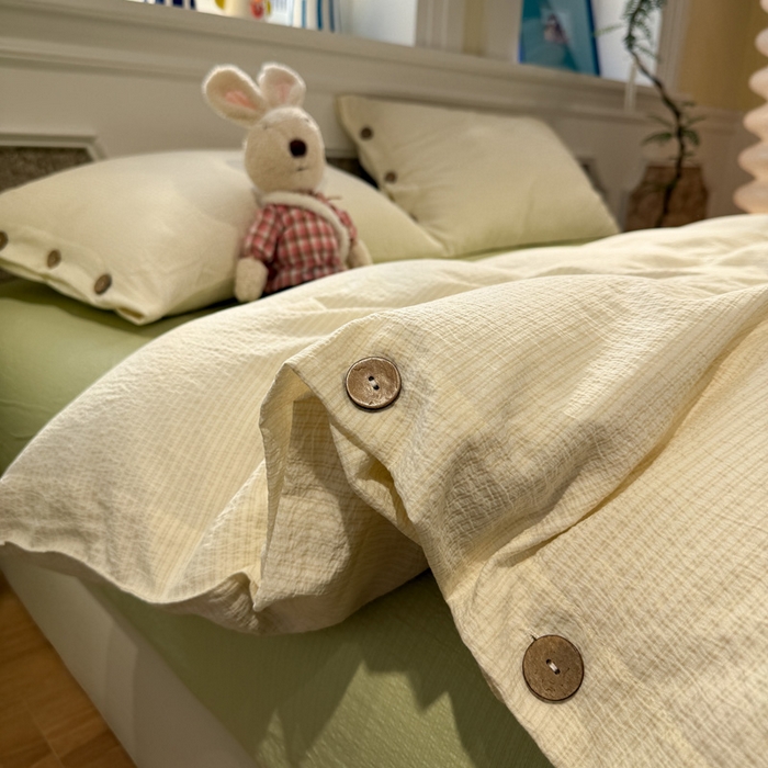 91家纺网 家纺一手货源 找家纺 水墨江南 2026新款无印风水洗提花纽扣款四件套 柠檬细条