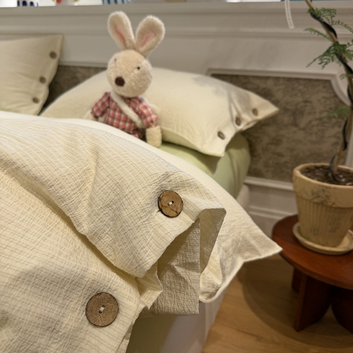 91家纺网 家纺一手货源 找家纺 水墨江南 2026新款无印风水洗提花纽扣款四件套 柠檬细条