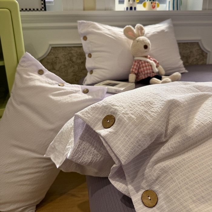 91家纺网 家纺一手货源 找家纺 水墨江南 2026新款无印风水洗提花纽扣款四件套 芋泥紫条