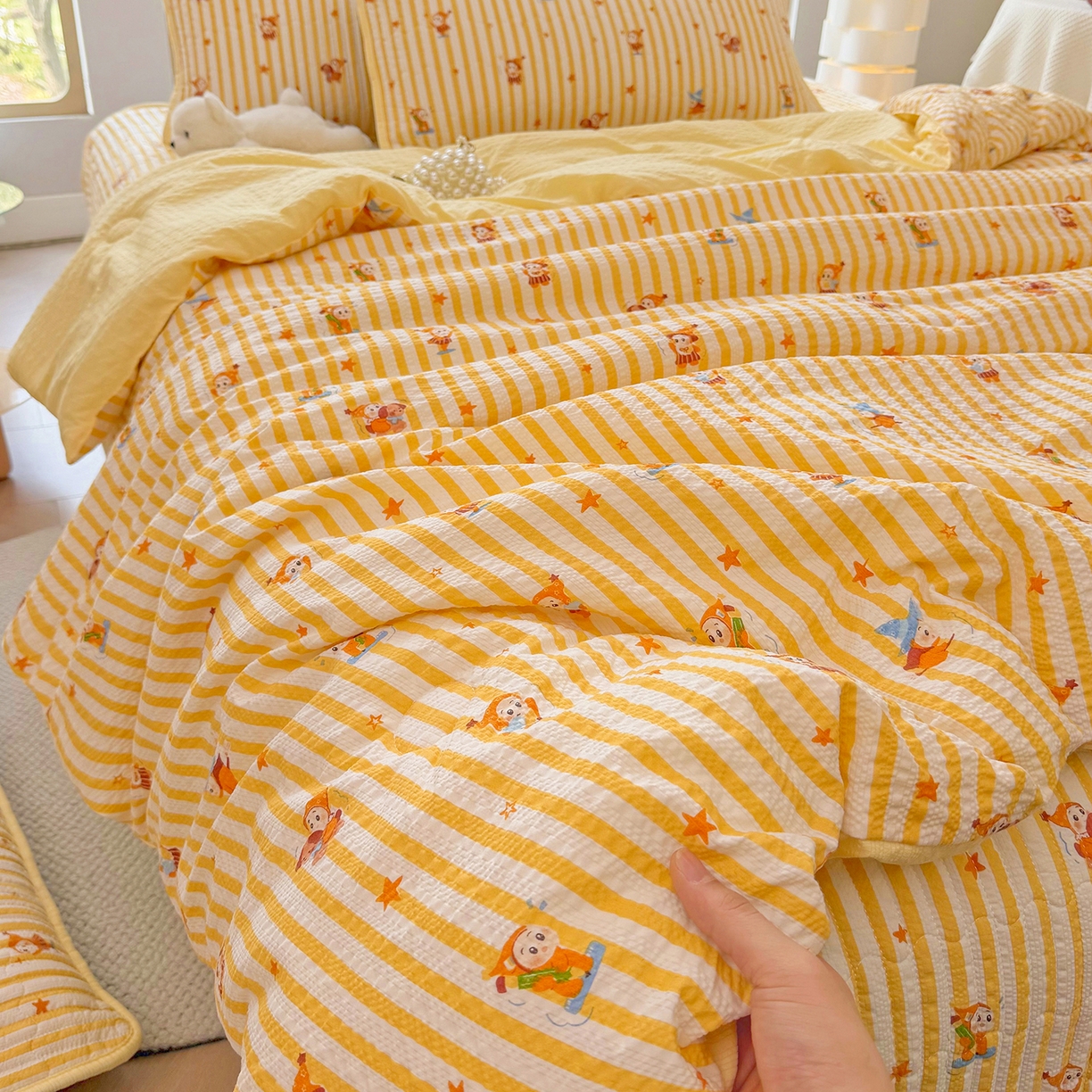 91家纺网 家纺一手货源 找家纺 悠米悠家 2026春夏新款泡泡纱印花夏被夏凉被空调被 元气星星人