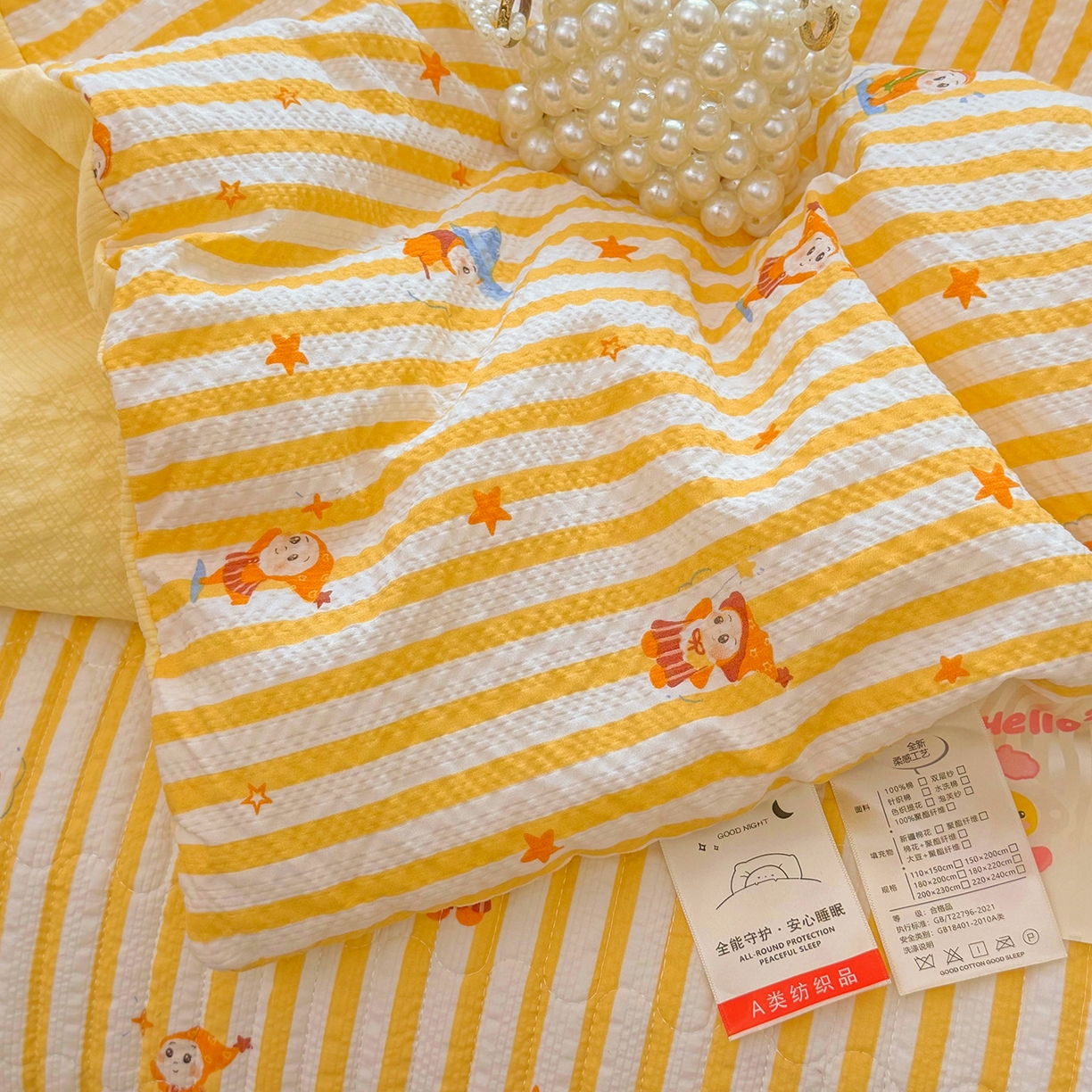 91家纺网 家纺一手货源 找家纺 悠米悠家 2026春夏新款泡泡纱印花夏被夏凉被空调被 元气星星人