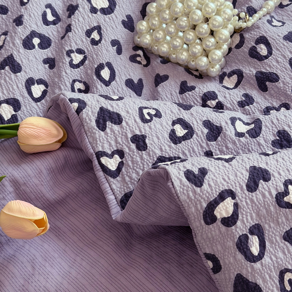 91家纺网 家纺一手货源 找家纺 悠米悠家 2026春夏新款泡泡纱印花夏被夏凉被空调被 香芋豹纹心