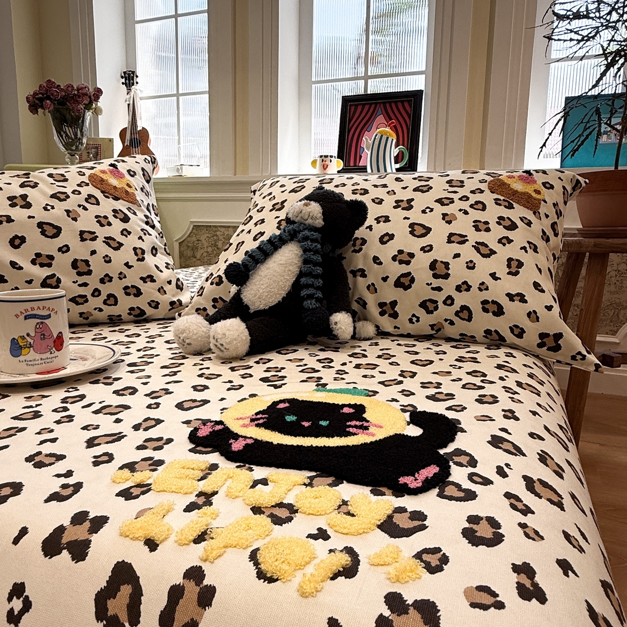 91家纺网 家纺一手货源 找家纺 觅糖家纺 2026新款大版卡通毛巾绣老粗布凉席席子系列 豹纹猫咪