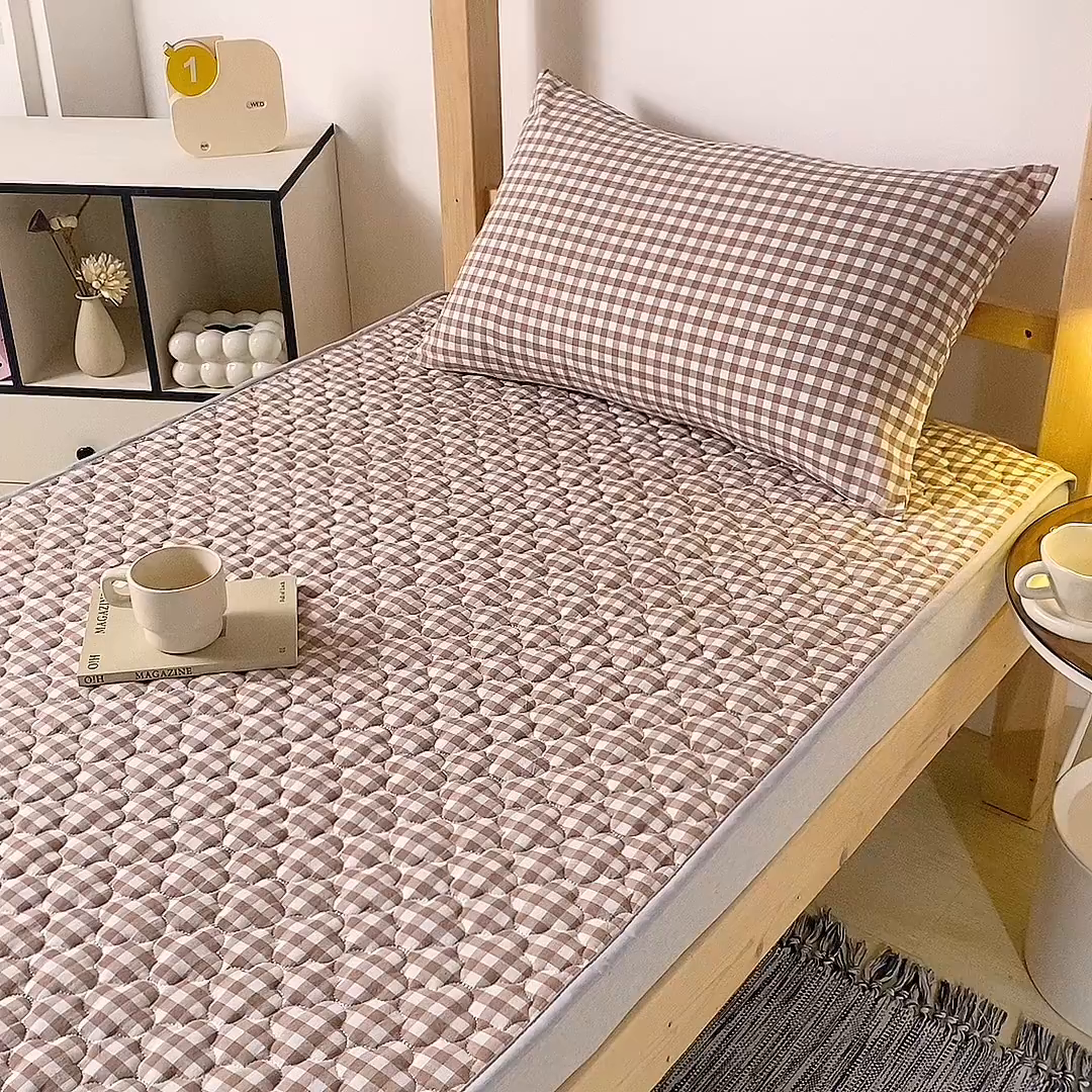 91家纺网 家纺一手货源 找家纺 乐逸家纺 2026新款A类纯棉全棉色织水洗棉床护垫床褥学生宿舍单人出租房专用可水洗床褥软床垫 全棉床褥驼小格